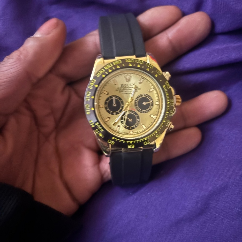 Rolex Gold Dial with Black Strap